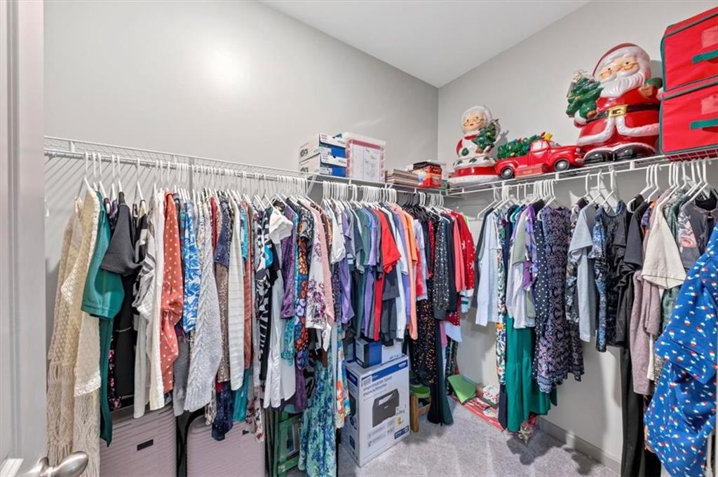 51 Dorsey Way Monroe, GA 30655 - Photo 36 of 54 a view of walk in closet with clothes