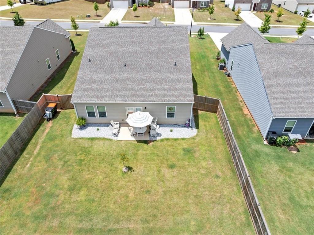51 Dorsey Way Monroe, GA 30655 - Photo 44 of 54 a aerial view of a house with swimming pool