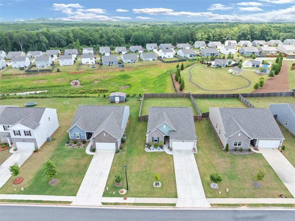 51 Dorsey Way Monroe, GA 30655 - Photo 45 of 54 an aerial view of a house with a swimming pool yard and outdoor seating