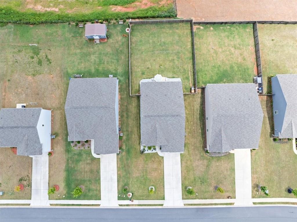 51 Dorsey Way Monroe, GA 30655 - Photo 46 of 54 an aerial view of residential house with outdoor space and lake view
