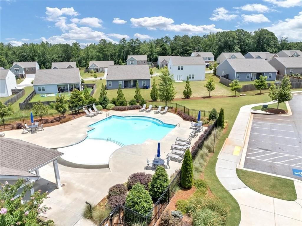 51 Dorsey Way Monroe, GA 30655 - Photo 50 of 54 an aerial view of residential houses with outdoor space and swimming pool