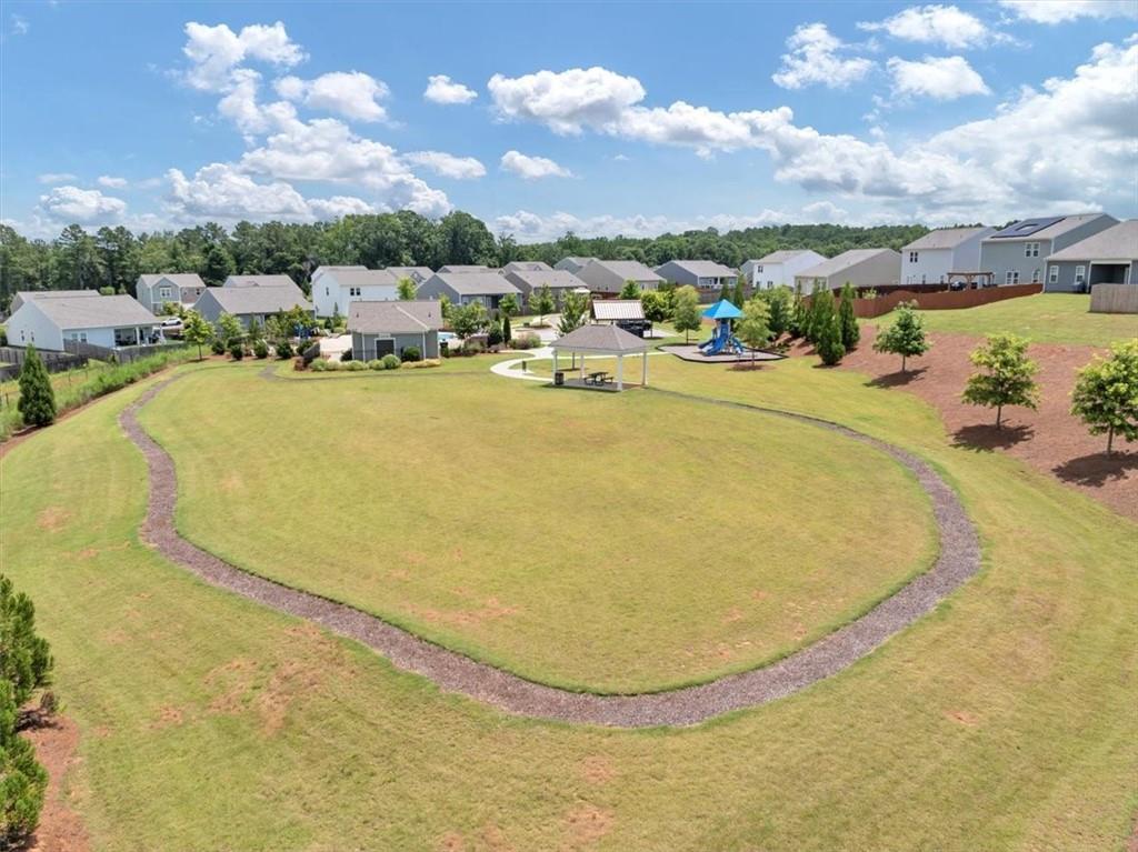 51 Dorsey Way Monroe, GA 30655 - Photo 53 of 54 a view of swimming pool and outdoor seating