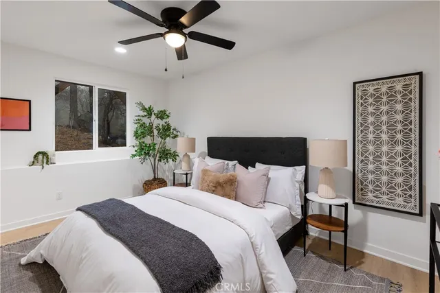 a view of entryway with stairs and wooden floor