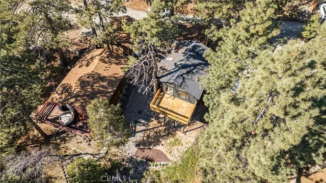 a view of balcony with wooden floor and fence