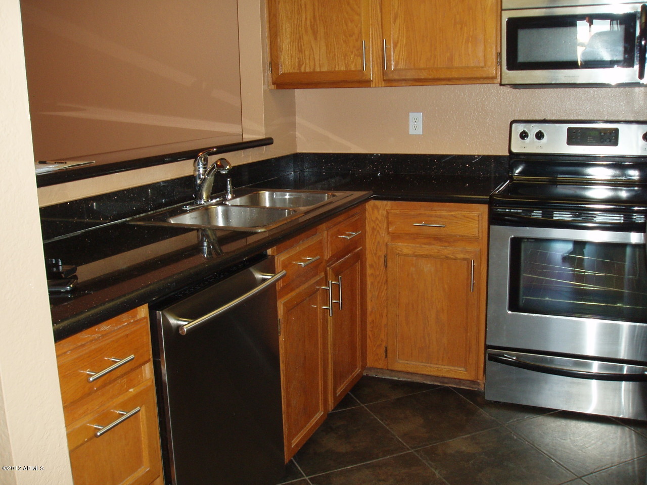 1645 West Baseline Road, Unit 1022 Mesa, AZ 85202 - Photo 9 of 23 Kitchen w/Granite Counters