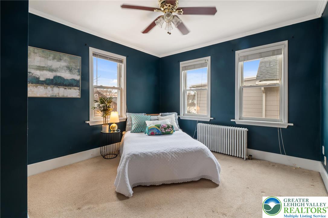 743 Front Street Hellertown, PA 18055 - Photo 14 of 28 a bedroom with a bed and window