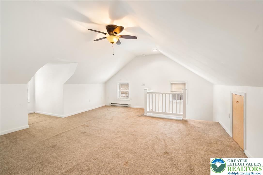 743 Front Street Hellertown, PA 18055 - Photo 18 of 28 a view of a livingroom with a ceiling fan and window