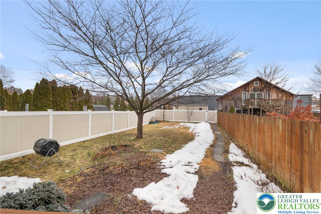 743 Front Street Hellertown, PA 18055 - Photo 24 of 28 a view of yard in front of house with trees