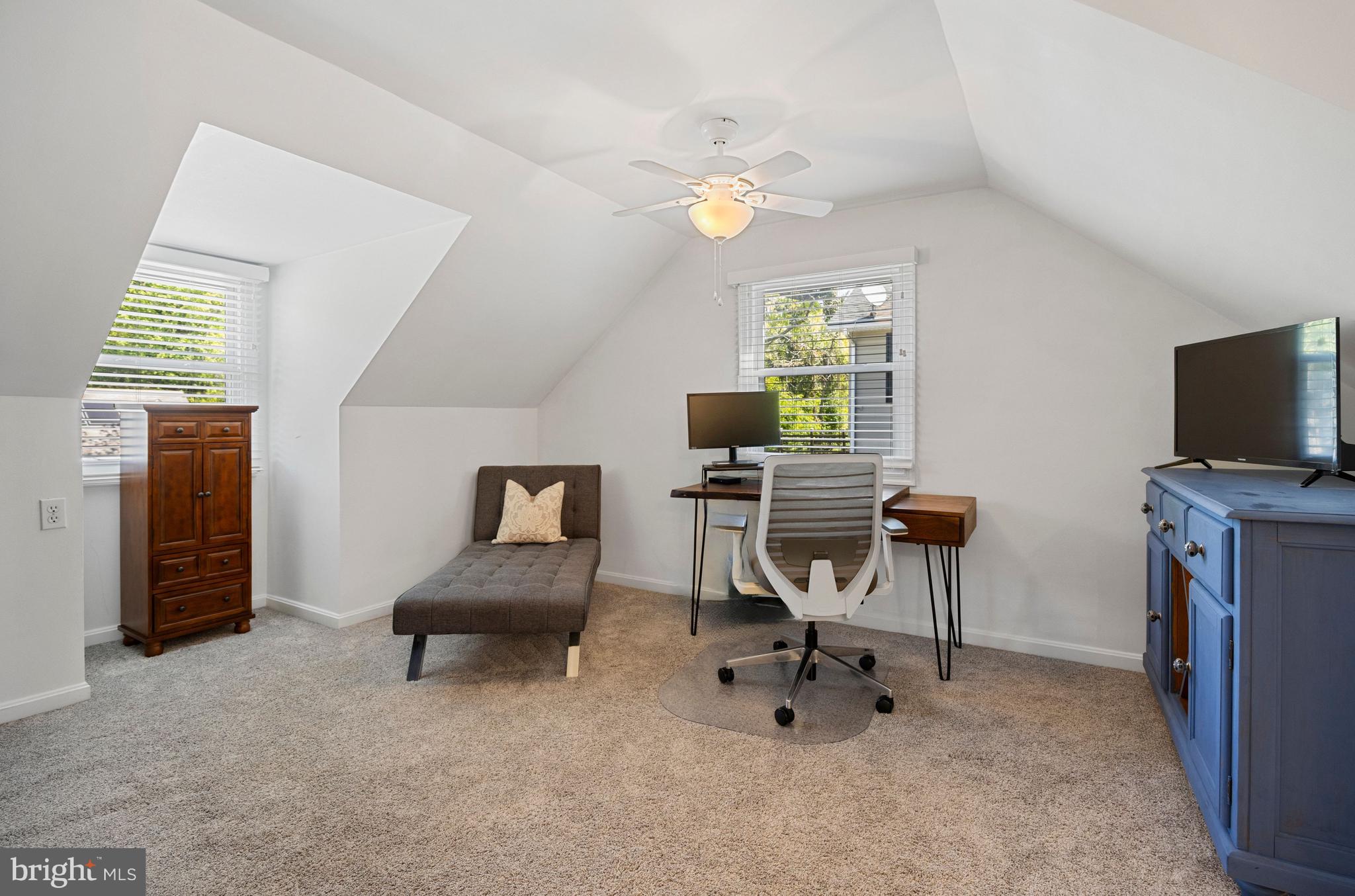 511 Greenwood Road Linthicum Heights, MD 21090 - Photo 11 of 26 a view of a workspace with furniture and a window