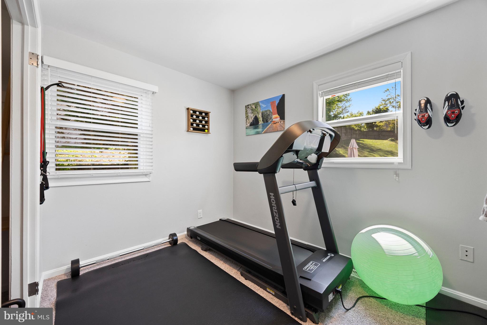 511 Greenwood Road Linthicum Heights, MD 21090 - Photo 14 of 26 a room with gym equipment and a window