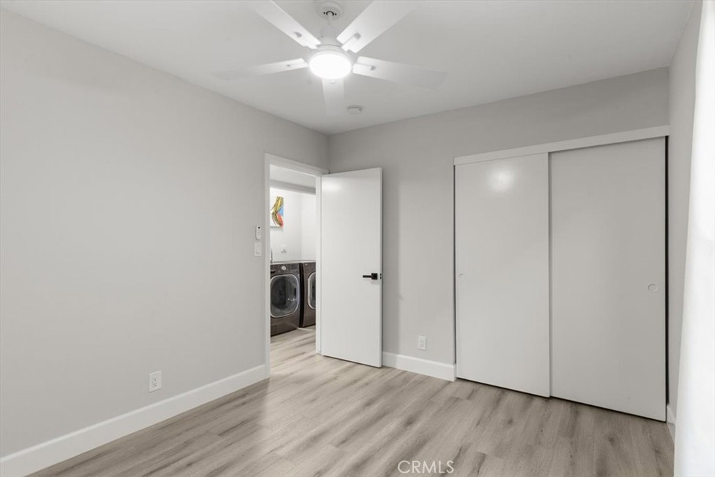 1353 Termino Avenue Long Beach, CA 90804 - Photo 14 of 33 a view of an empty room with wooden floor