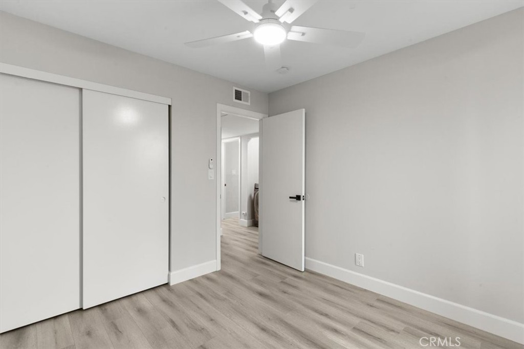 1353 Termino Avenue Long Beach, CA 90804 - Photo 16 of 33 a view of an empty room with wooden floor