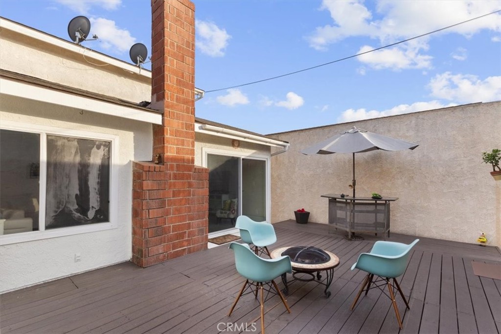 1353 Termino Avenue Long Beach, CA 90804 - Photo 23 of 33 a living room with furniture and a wooden floor