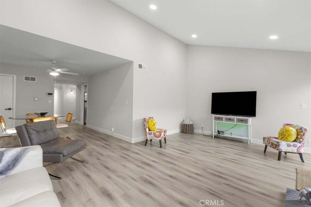 1353 Termino Avenue Long Beach, CA 90804 - Photo 7 of 33 a living room with furniture and a flat screen tv