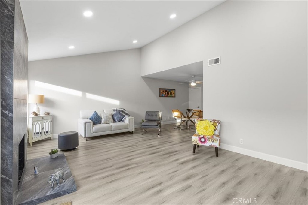 1353 Termino Avenue Long Beach, CA 90804 - Photo 8 of 33 a living room with furniture and wooden floor