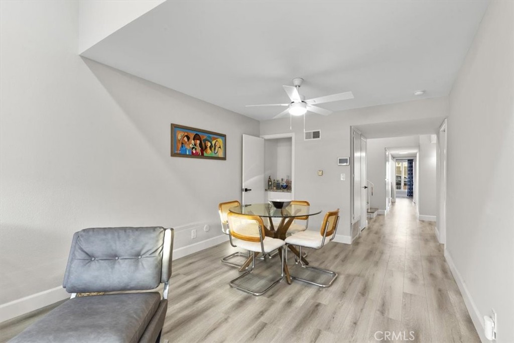 1353 Termino Avenue Long Beach, CA 90804 - Photo 9 of 33 a living room with furniture and wooden floor