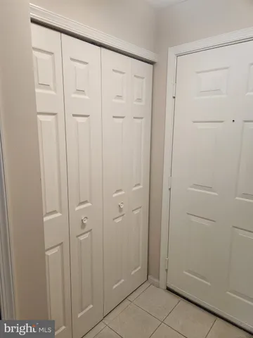 an empty room with fireplace