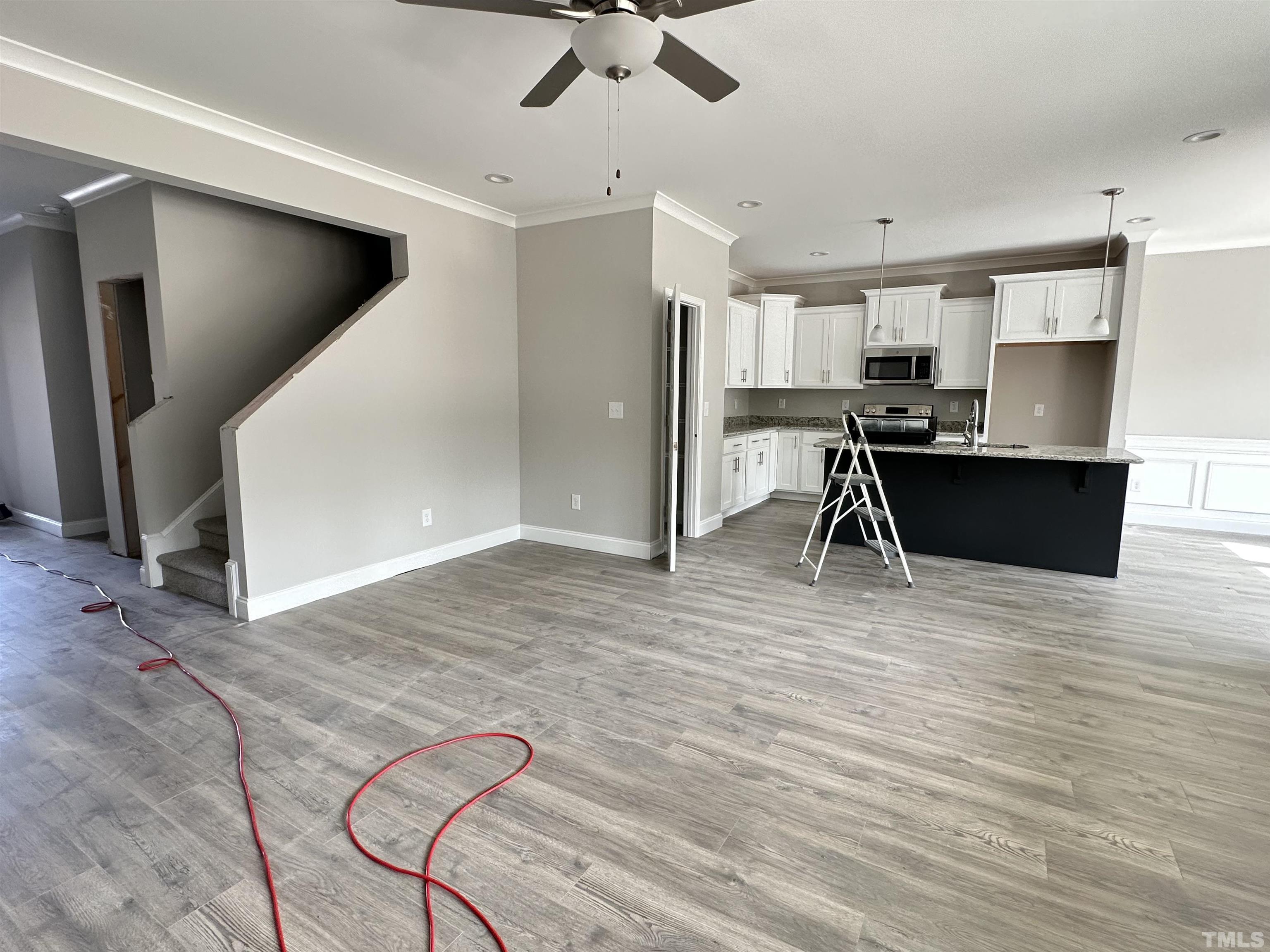 448 Jackson Pond Drive Smithfield, NC 27577 - Photo 23 of 25 a view of a kitchen with a sink and a refrigerator