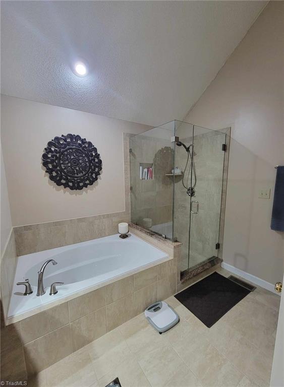 3857 Sandlewood Road High Point, NC 27265 - Photo 20 of 42 Garden tub & separate shower, beautiful tile