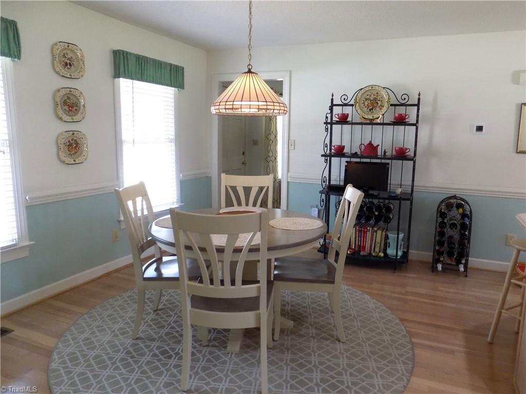 3857 Sandlewood Road High Point, NC 27265 - Photo 3 of 42 Spacious breakfast room, chair rail molding