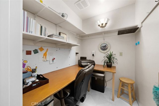 a room with furniture and wooden floor