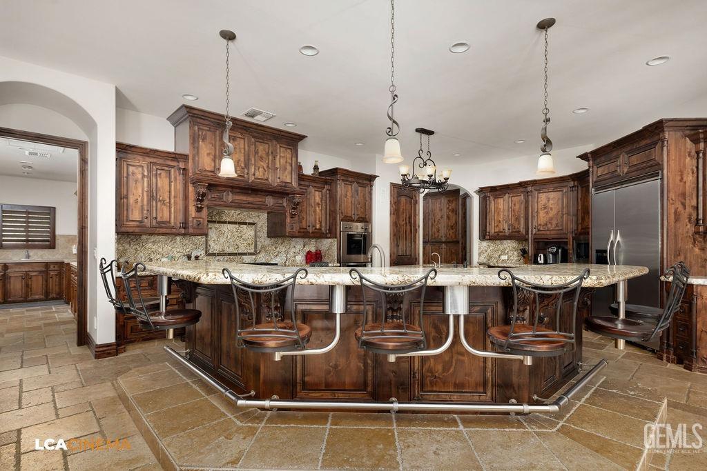 Undisclosed Address Keene, CA 93531 - Photo 11 of 46 a view of a dining hall with many windows