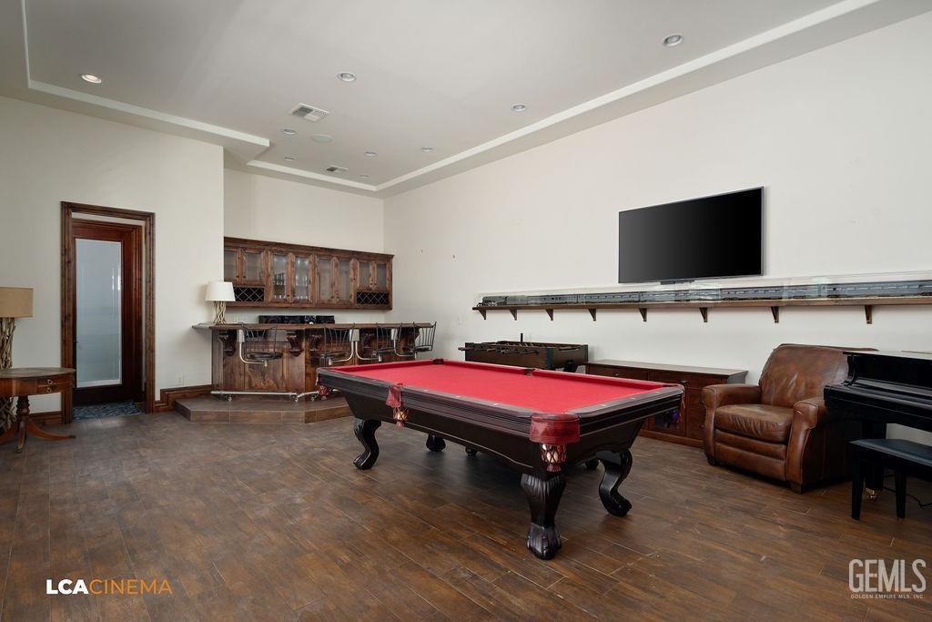 Undisclosed Address Keene, CA 93531 - Photo 15 of 46 a bedroom with furniture and a flat screen tv