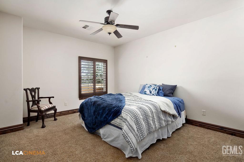 Undisclosed Address Keene, CA 93531 - Photo 29 of 46 a spacious bedroom with a bed a table and chair