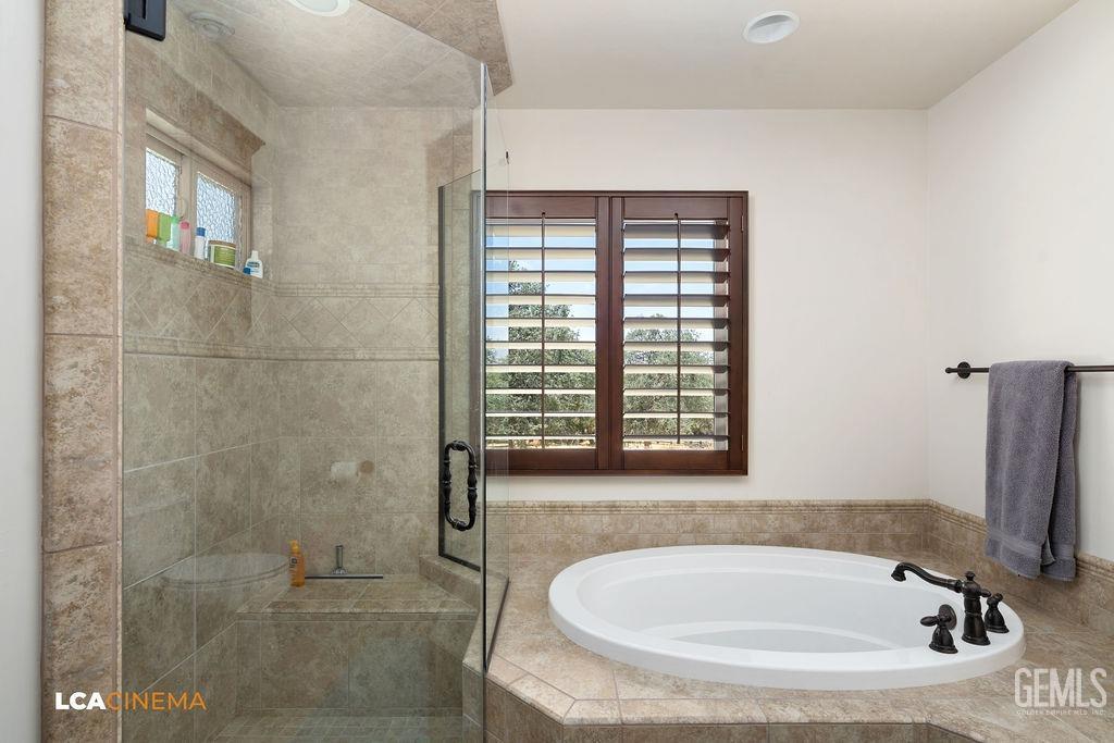 Undisclosed Address Keene, CA 93531 - Photo 31 of 46 a bathroom with a tub and shower