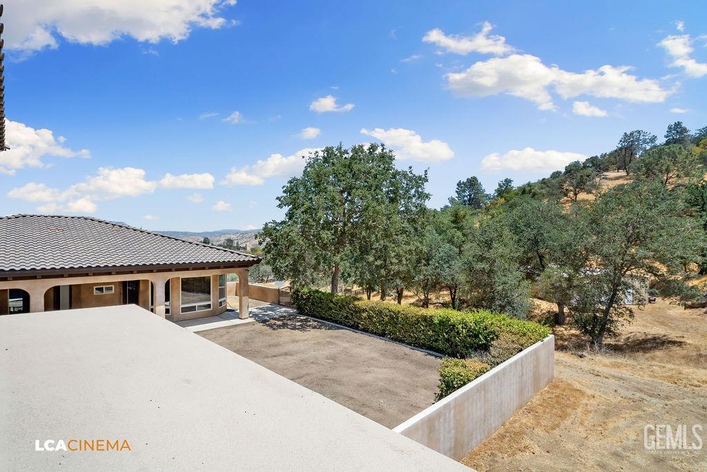 Undisclosed Address Keene, CA 93531 - Photo 34 of 46 a house with trees in the background