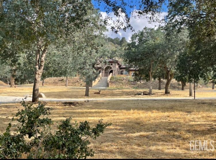 Undisclosed Address Keene, CA 93531 - Photo 46 of 46 a view of a swimming pool with an outdoor space and seating area