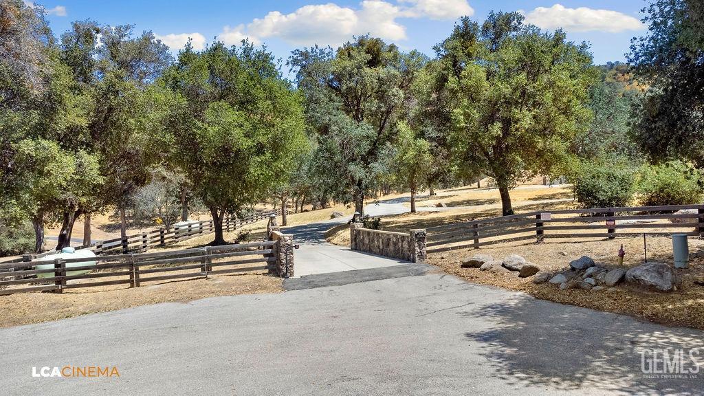 Undisclosed Address Keene, CA 93531 - Photo 5 of 46 a view of a swimming pool with some trees