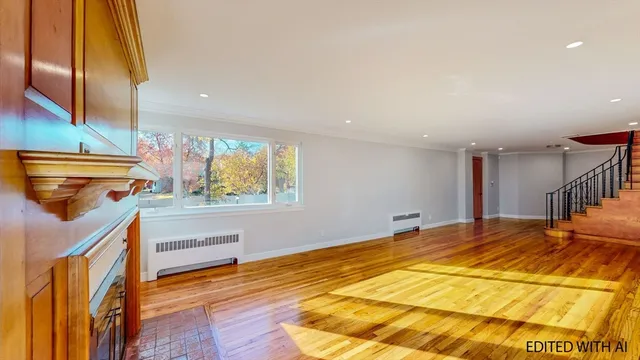a view of a livingroom with a fireplace a fireplace and windows