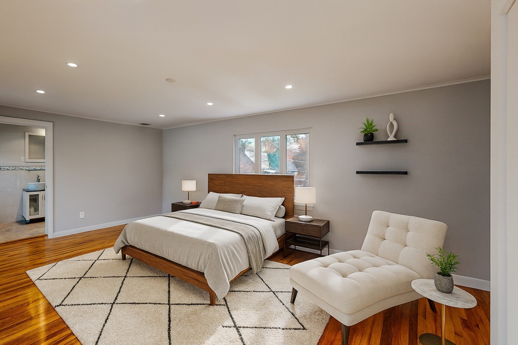 36 Lorna Road, Unit SF Newton, MA 02459 - Photo 24 of 25 a bedroom with bed and a couch