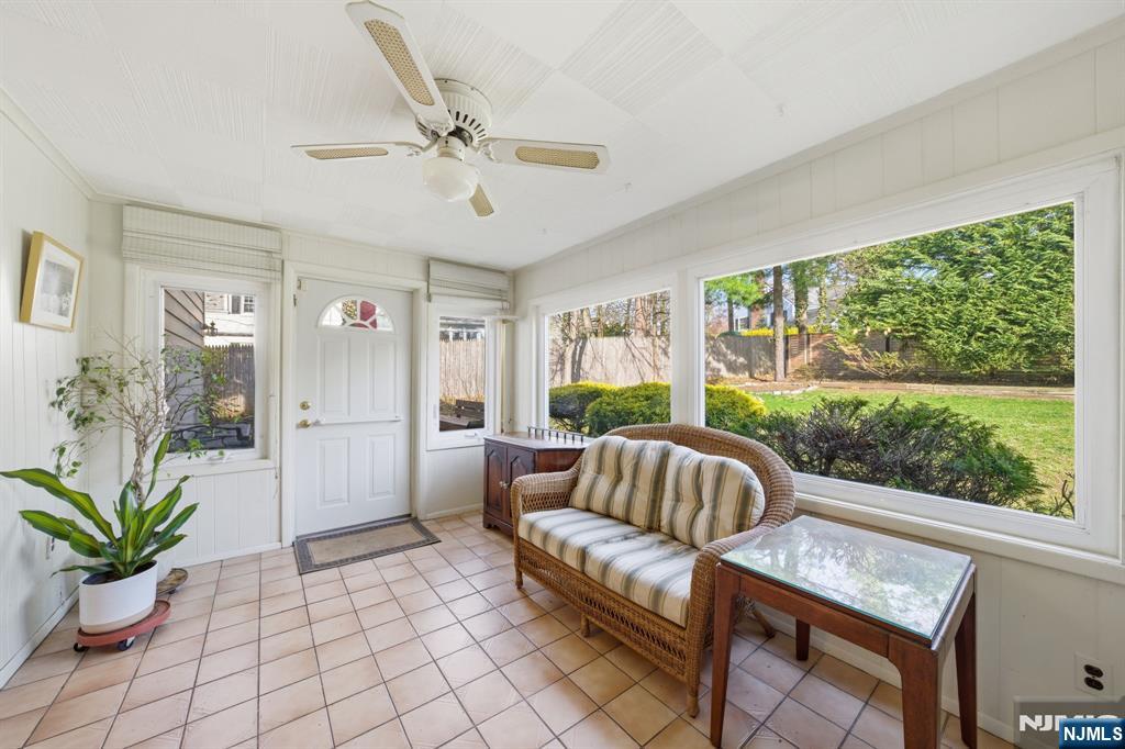 168 Engle Street Tenafly, NJ 07670 - Photo 13 of 50 a living room with furniture a bed and a large window