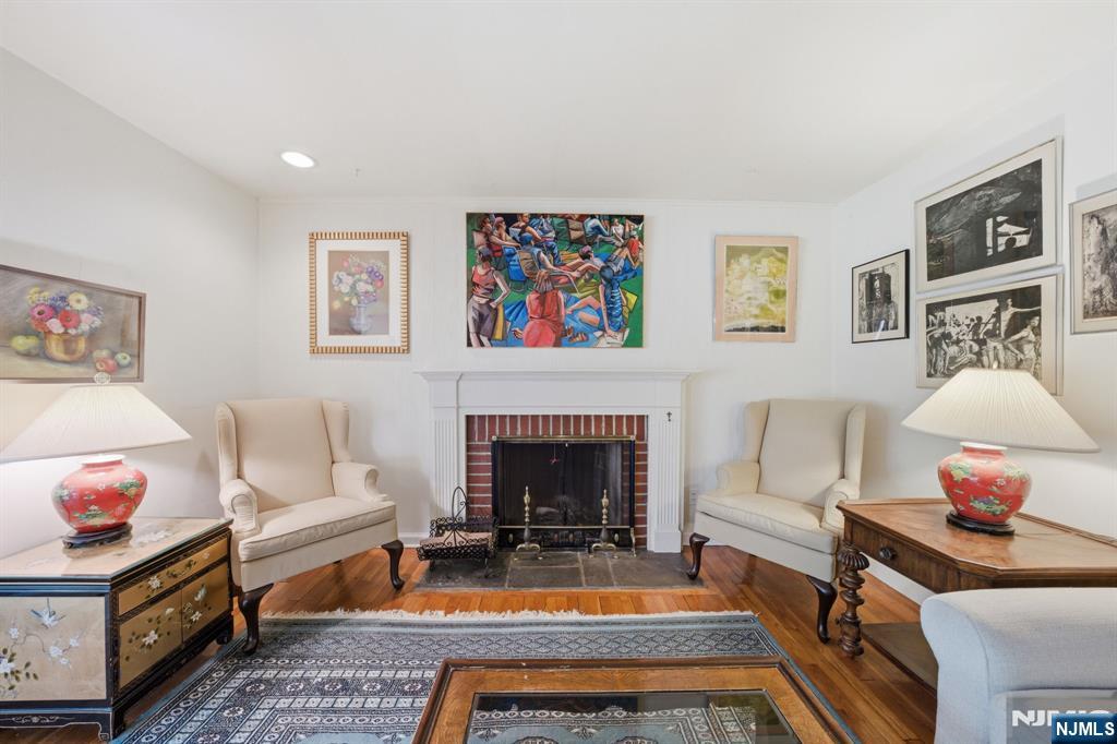 168 Engle Street Tenafly, NJ 07670 - Photo 19 of 50 a living room with furniture fireplace and painting on the wall