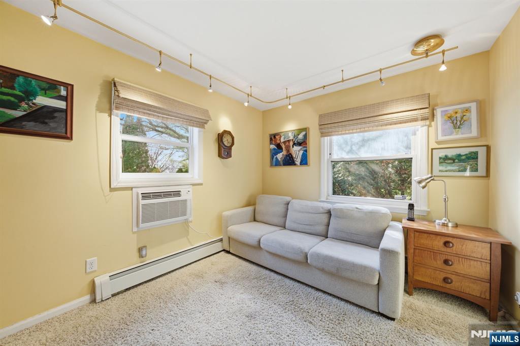 168 Engle Street Tenafly, NJ 07670 - Photo 23 of 50 a living room with furniture and a window
