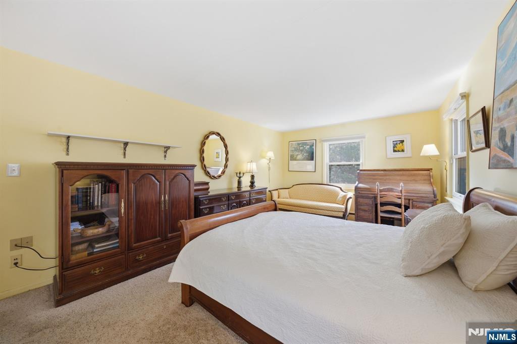168 Engle Street Tenafly, NJ 07670 - Photo 28 of 50 a bed room with two bed and a tv