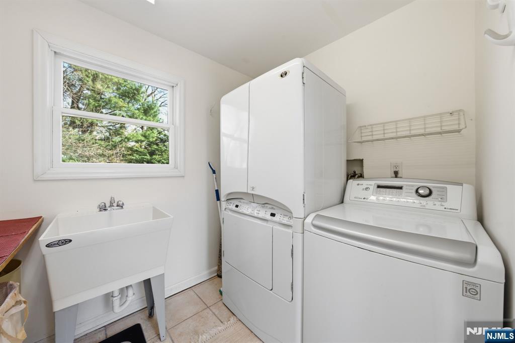 168 Engle Street Tenafly, NJ 07670 - Photo 31 of 50 a utility room with dryer and washer