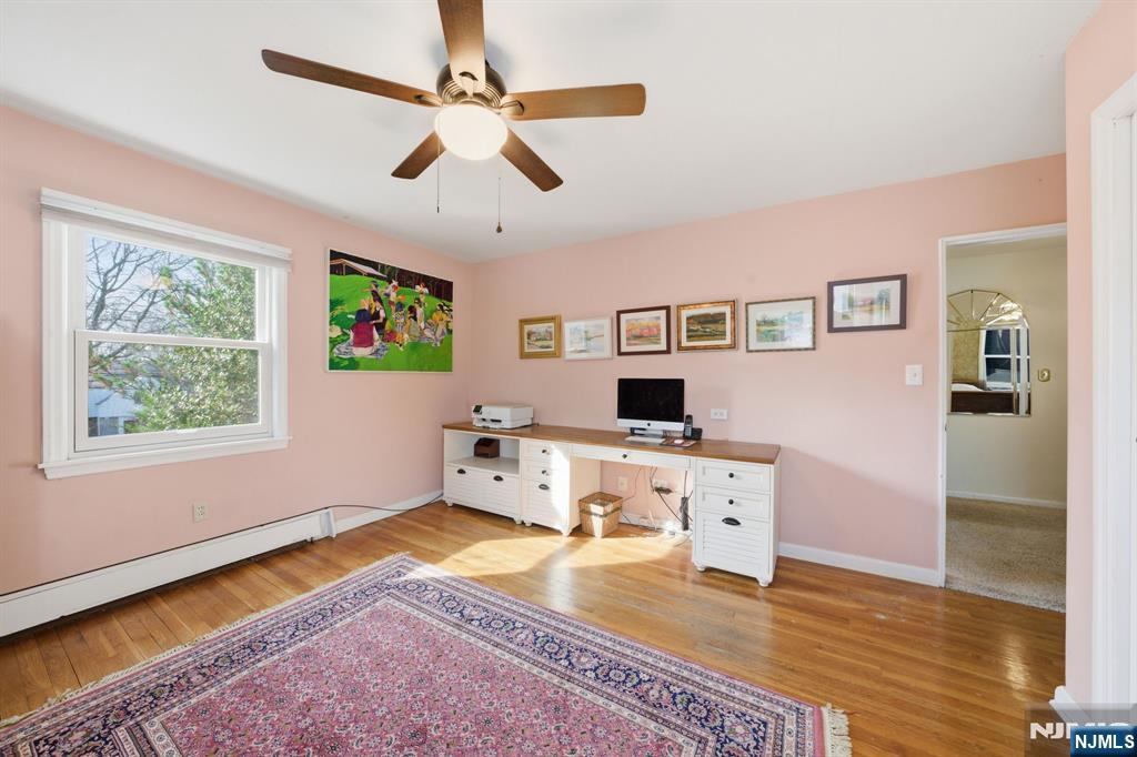 168 Engle Street Tenafly, NJ 07670 - Photo 35 of 50 a workspace with furniture window and wooden floor