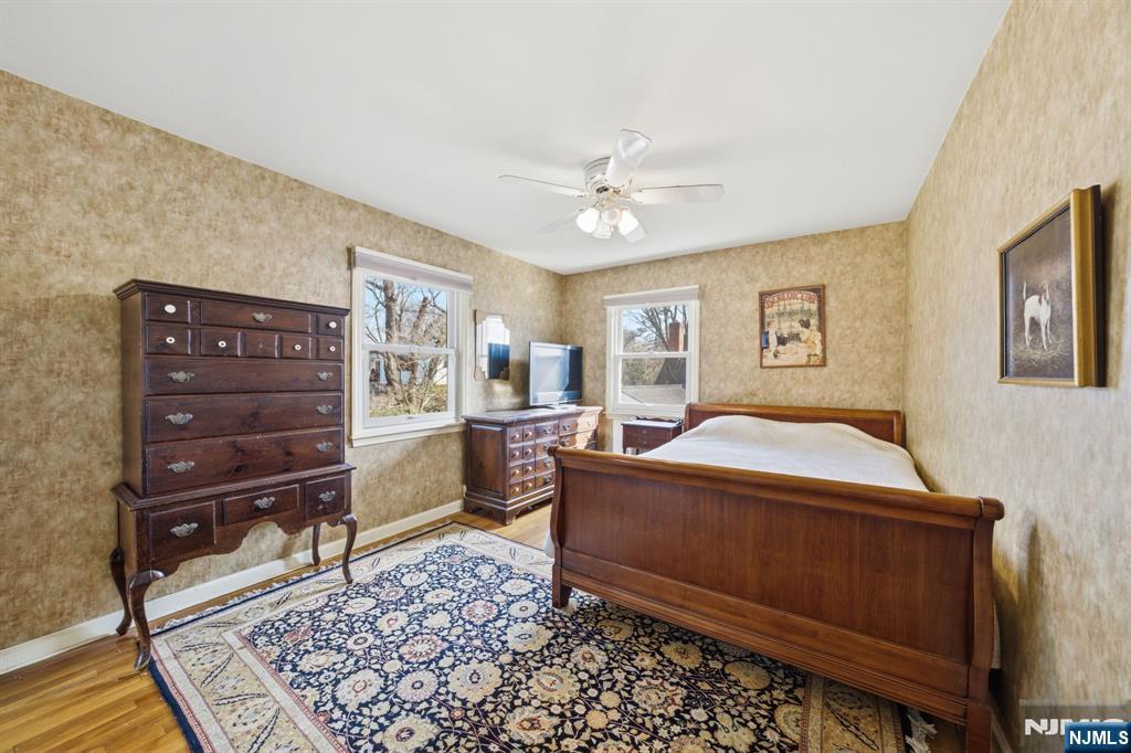168 Engle Street Tenafly, NJ 07670 - Photo 36 of 50 a living room with furniture and wooden floor
