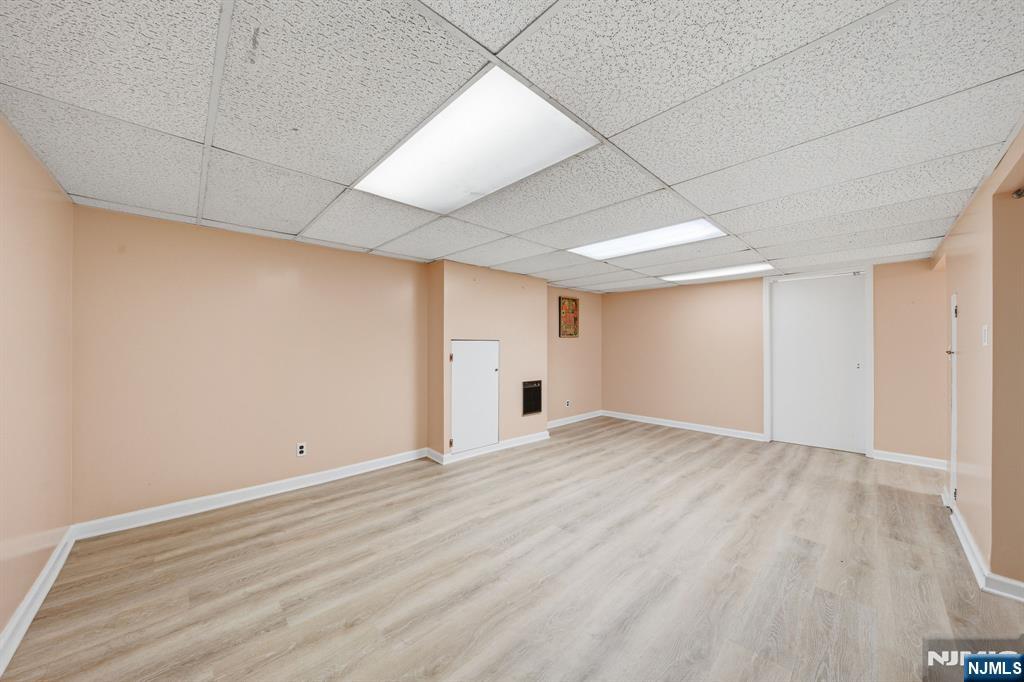 168 Engle Street Tenafly, NJ 07670 - Photo 40 of 50 a view of an empty room with wooden floor