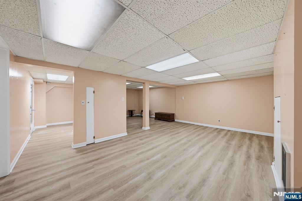 168 Engle Street Tenafly, NJ 07670 - Photo 41 of 50 a view of an empty room with wooden floor