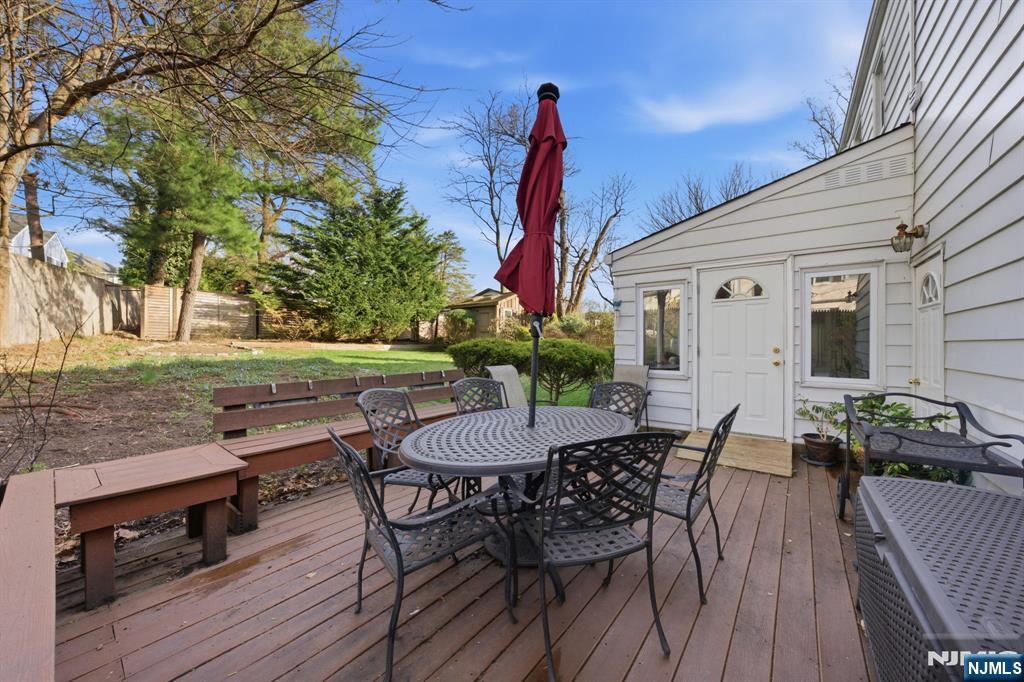 168 Engle Street Tenafly, NJ 07670 - Photo 42 of 50 a view of a dinning table and chairs in the patio