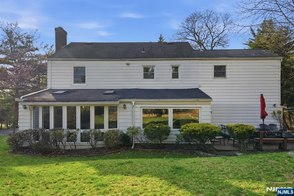 168 Engle Street Tenafly, NJ 07670 - Photo 45 of 50 a front view of a house with a yard