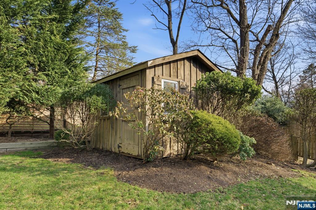 168 Engle Street Tenafly, NJ 07670 - Photo 46 of 50 a backyard of a house with lots of green space