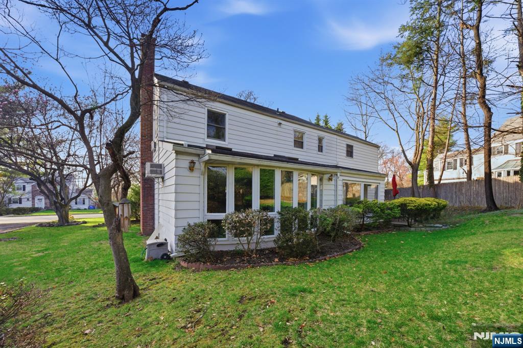 168 Engle Street Tenafly, NJ 07670 - Photo 47 of 50 a view of a house with backyard and garden