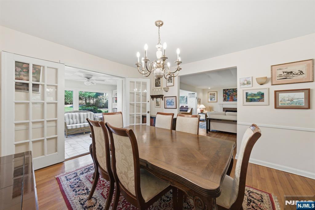 168 Engle Street Tenafly, NJ 07670 - Photo 10 of 50 a view of a dining room with furniture and wooden floor