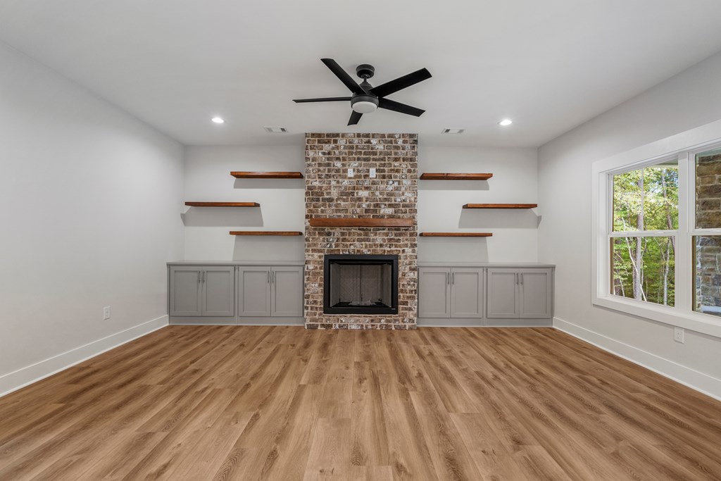 299 Ridgeway Drive Cataula, GA 31804 - Photo 11 of 52 a living room with a fireplace