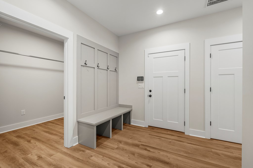 299 Ridgeway Drive Cataula, GA 31804 - Photo 21 of 52 a view of an empty room with wooden floor